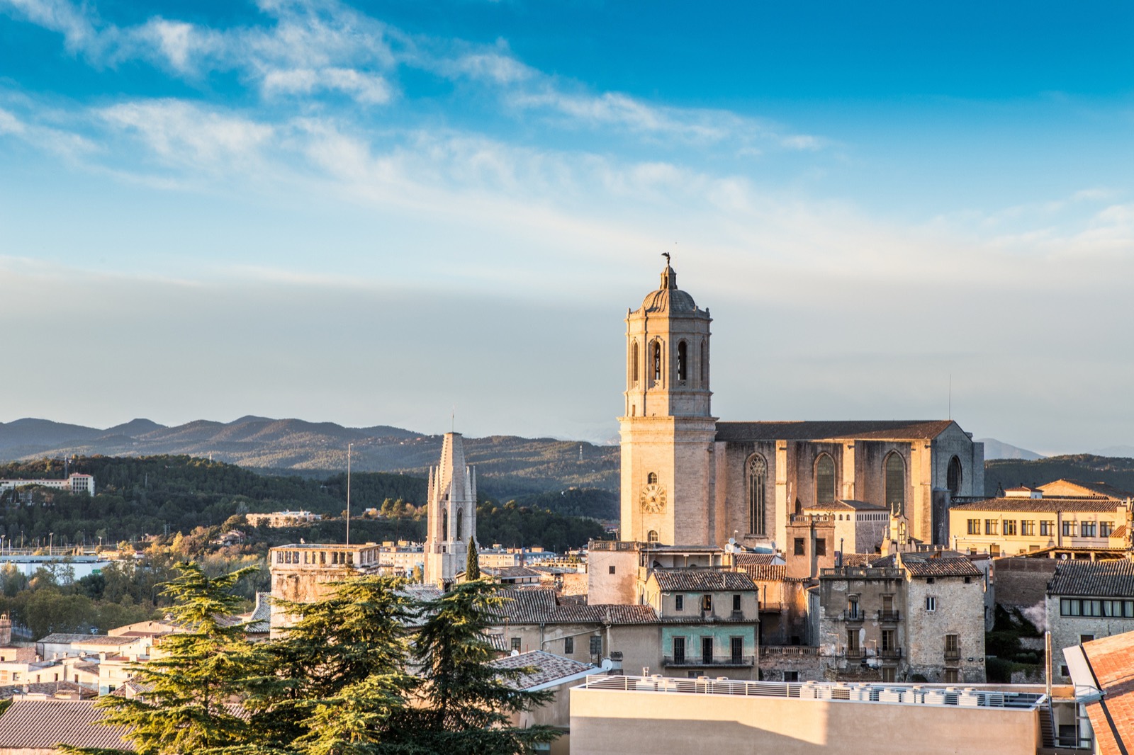 The cathedral and bell towers of Girona's old quarter at golden hour